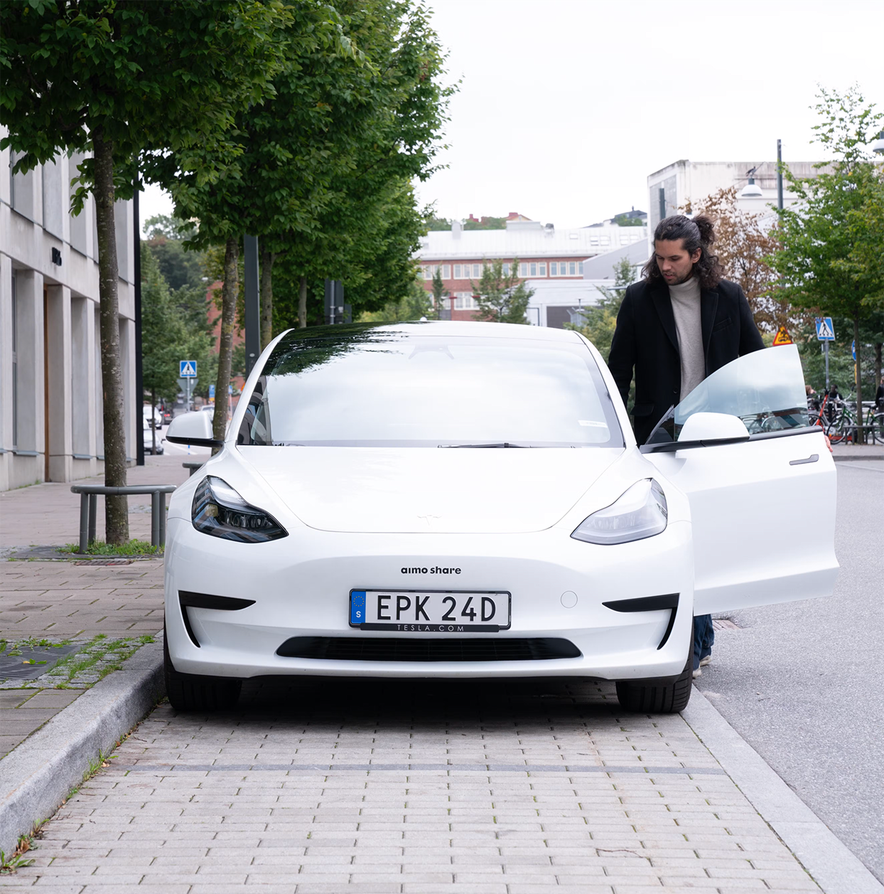 Aimo Share car sharing Tesla model 3 car